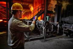 Lifestyle photography of FLIR E95 in steel mill for FLIR