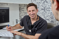 lifestyle photography of dentist for Nevins Dental Center in Boston, MA
