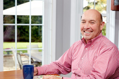 Lifestyle photography of man smiling for Renoviso in Boston, MA