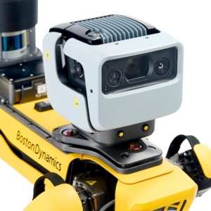 A detailed close-up shot of the sensor suite mounted on a Boston Dynamics Spot robot. This industrial product photo focuses on the Leica BLKARC&rsquo;s multi-camera array and heat sink, demonstrating the photographer's ability to capture intricate textures, metallic finishes, and complex hardware components.