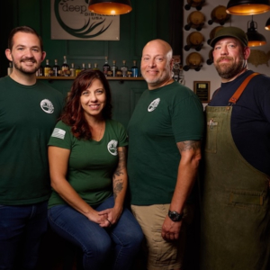Group photo of staff at Deep Roots Distillery of Sturbridge, MA Group photo of staff at Deep Roots Distillery of Sturbridge, MA