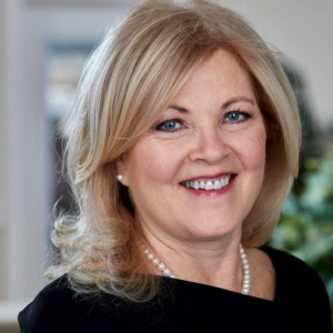 woman headshot photography with office background for Perkins and Anctil in Westford, MA woman headshot photography with office background for Perkins and Anctil in Westford, MA