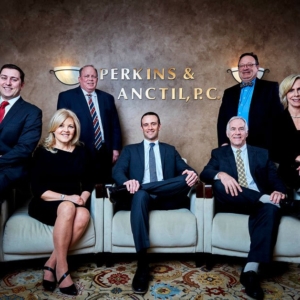 Group portrait photography with office background for Perkins and Anctil in Westford, MA Group portrait photography with office background for Perkins and Anctil in Westford, MA