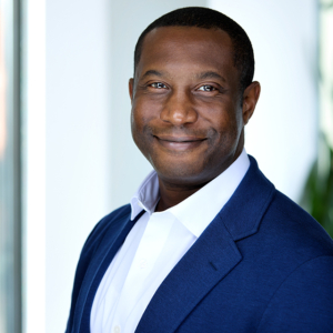 man headshot with office background for headshot photography with Rare Beauty Brands at a WorkBar in Boston, MA man headshot with office background for headshot photography with Rare Beauty Brands at a WorkBar in Boston, MA