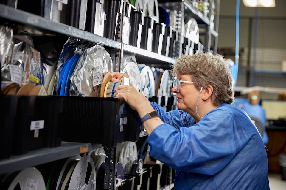 worker picking products lifestyle photography for Accutronics of Chelmsford, MA.