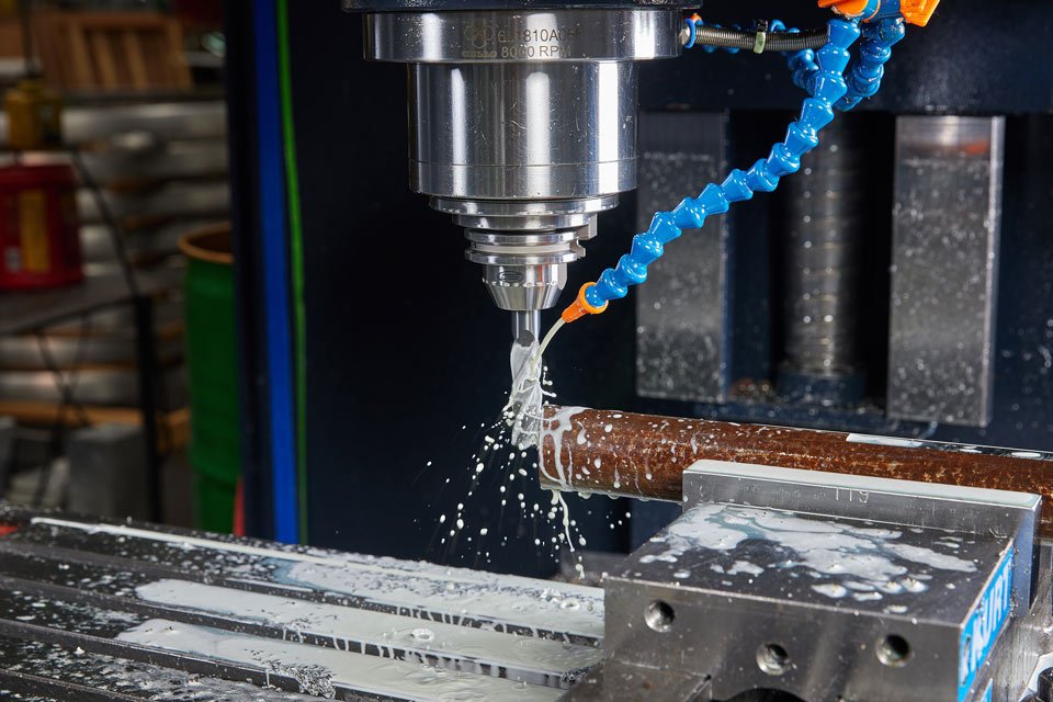 lifestyle photography of machine expelling liquid for B and F Machines of New Britain, CT.