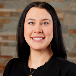 woman headshot photography with brick background for Serenity