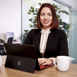 woman lifestyle headshot photography with office background for Coldwell Banker