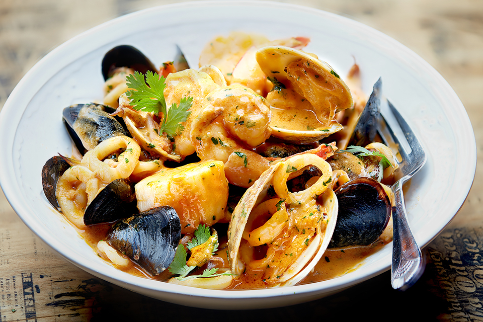 food photography of fish stew photographed for Guztazo Cuban Kitchen &amp; Bar in  Waltham, MA