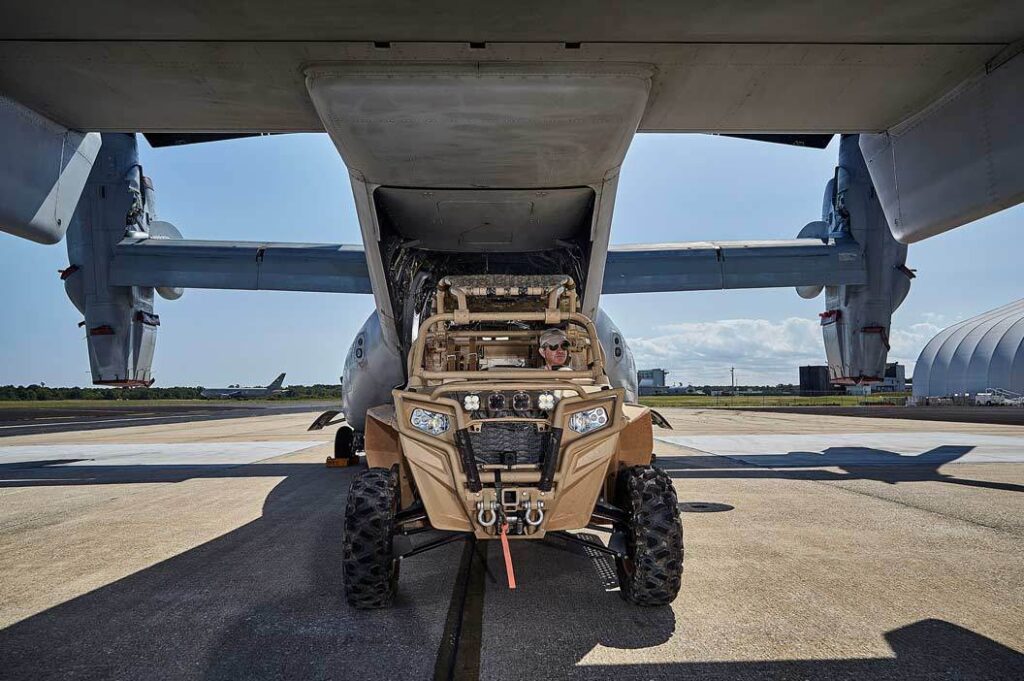 lifestyle photography of FLIR LTVX light tactical vehicle for FLIR lifestyle photography of man driving with FLIR LTVX light tactical vehicle for Teledyne-FLIR of Hudson, NH.
