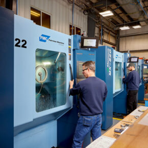 lifestyle photography for Fairview lifestyle photography of three male employees opening and using machines for Fairview