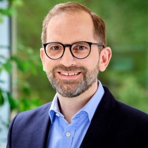 male headshot photography with office background for Getinge in Merrimack, NH male headshot photography with office background for Getinge in Merrimack, NH