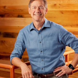 male headshot photography with wooden background for MAK Technologies in Cambridge, MA