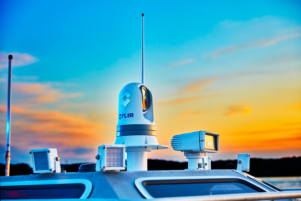 lifestyle photography of FLIR camera on top of vehicle at sunset for raymarine Teledyne-FLIR of Hudson, NH