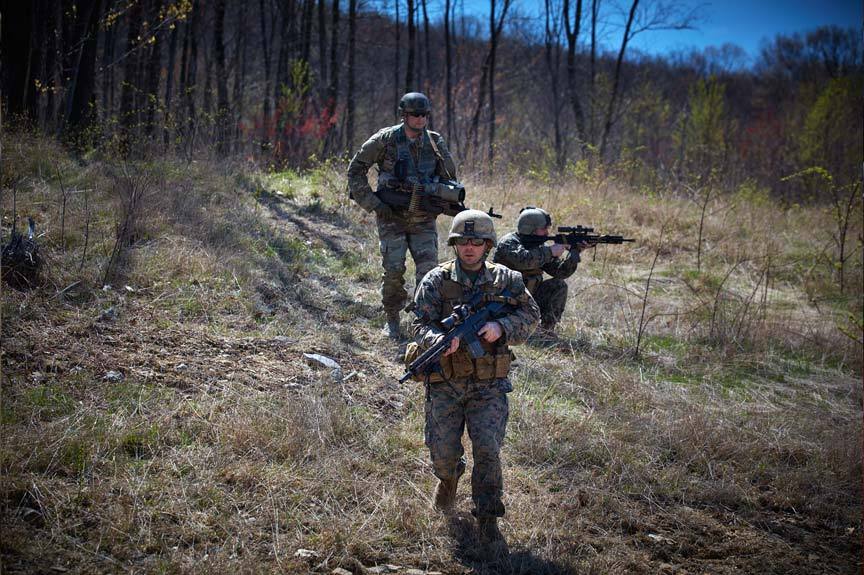 lifestyle photography of 3 US soldiers in the woods holding guns with thermal scopes for teledyne-flir of Hudson, NH